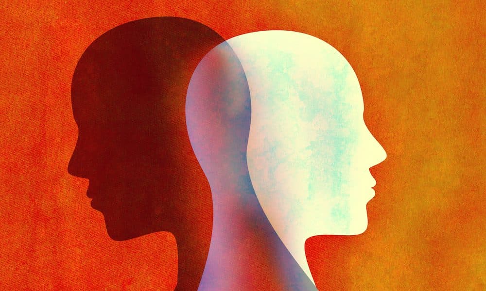Bipolar disorder mind mental concept. Change of mood. Emotions. Split personality. Dual personality. Head silhouette of man Wearables help to connect sleep quality to psychiatric disease